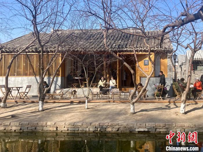 中外记者走进北京老城区感受历史文化传承创新