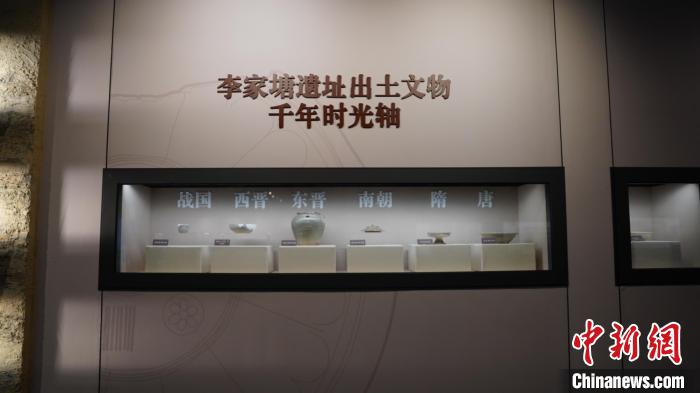 展出的李家塘遗址出土文物时间轴 杭州市园林文物局 供图